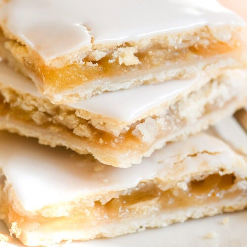 A stack of juicy apple pie bars.
