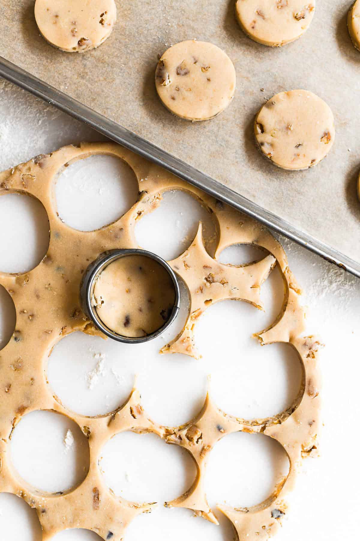 Cutting out maple walnut shortbread cookies.