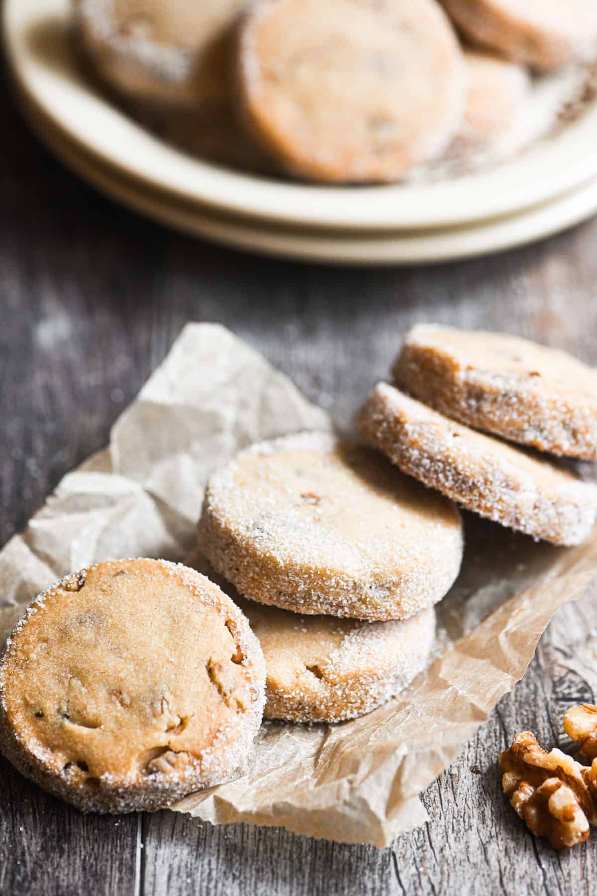 maple walnut cookies, on a wooden table.