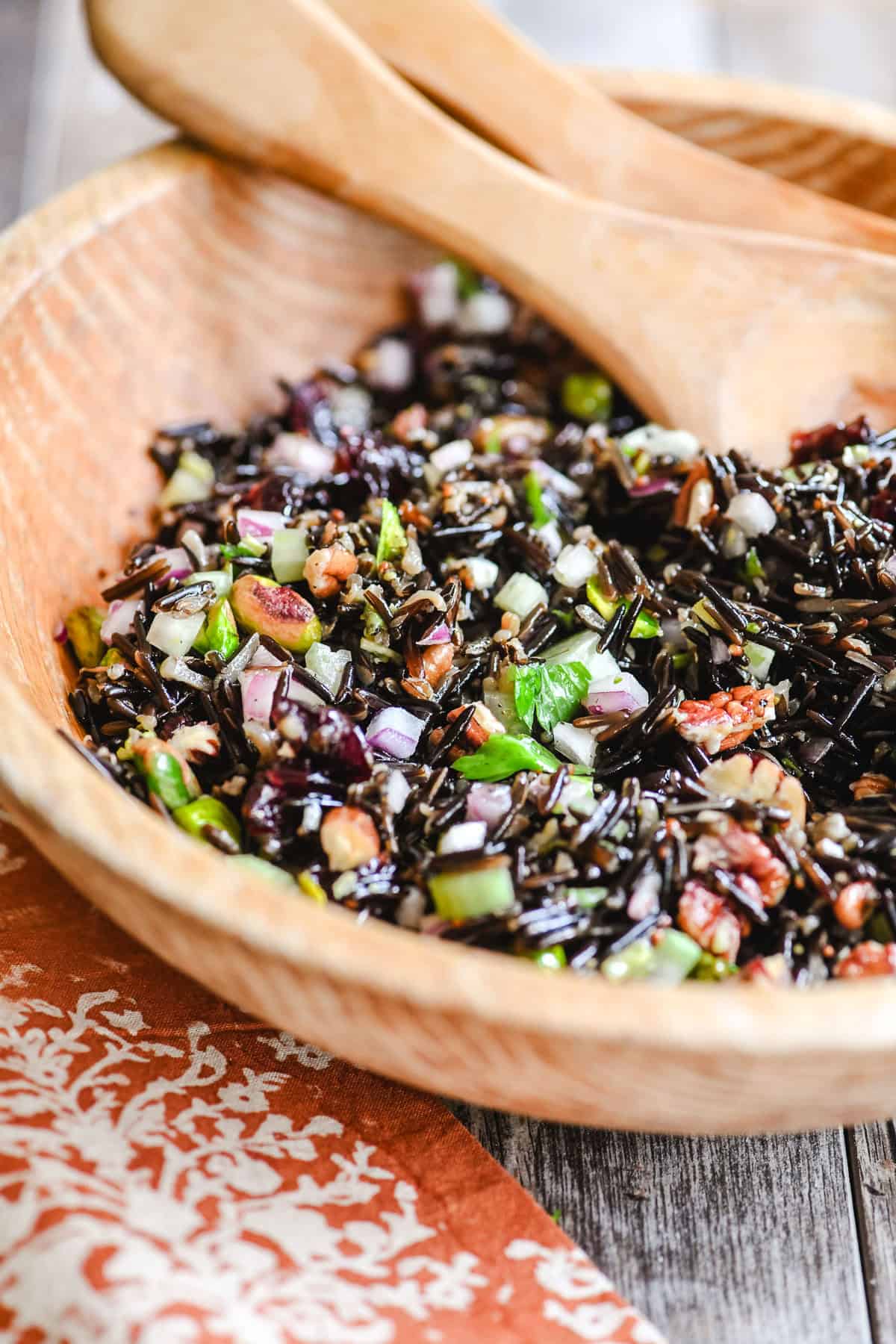 wild rice salad in a wooden bowl.