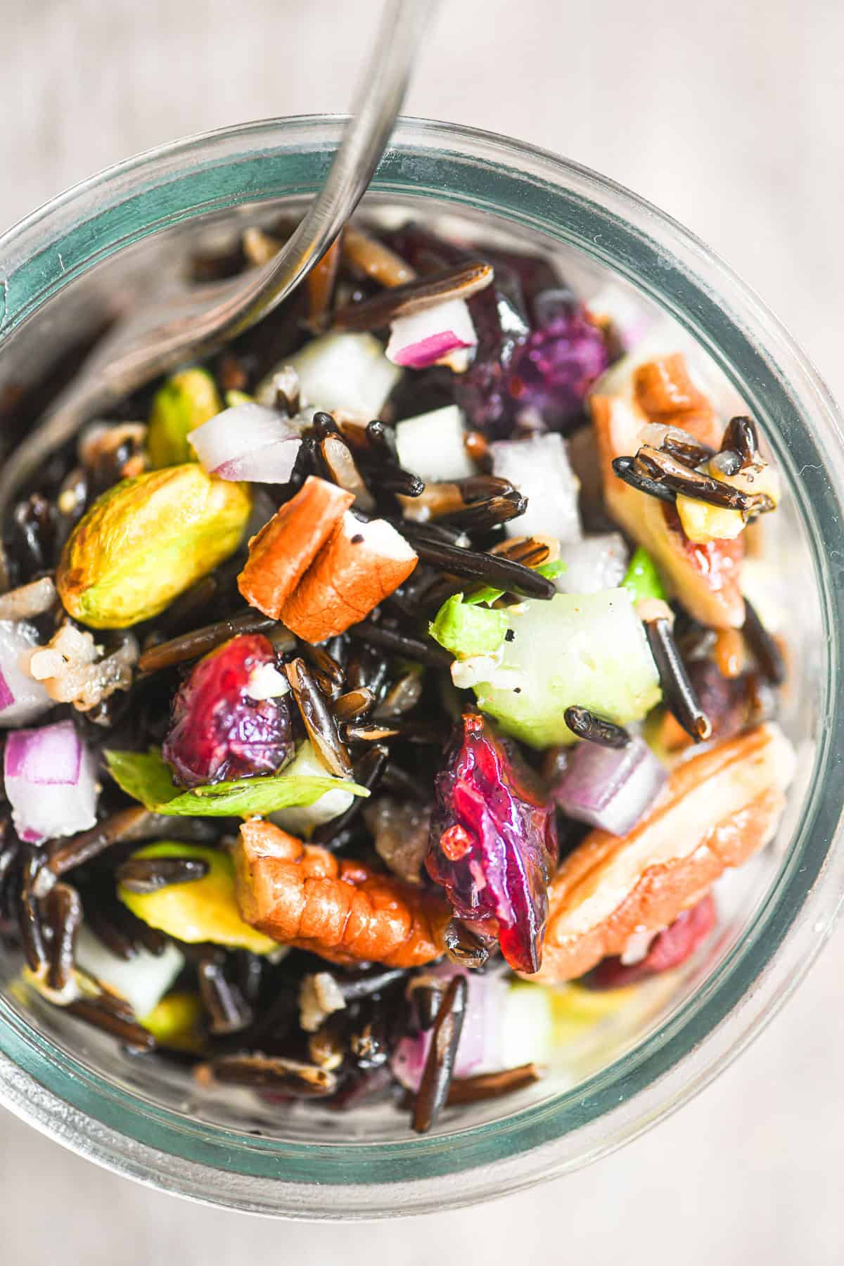 close look at colors and textures of a wild rice salad.