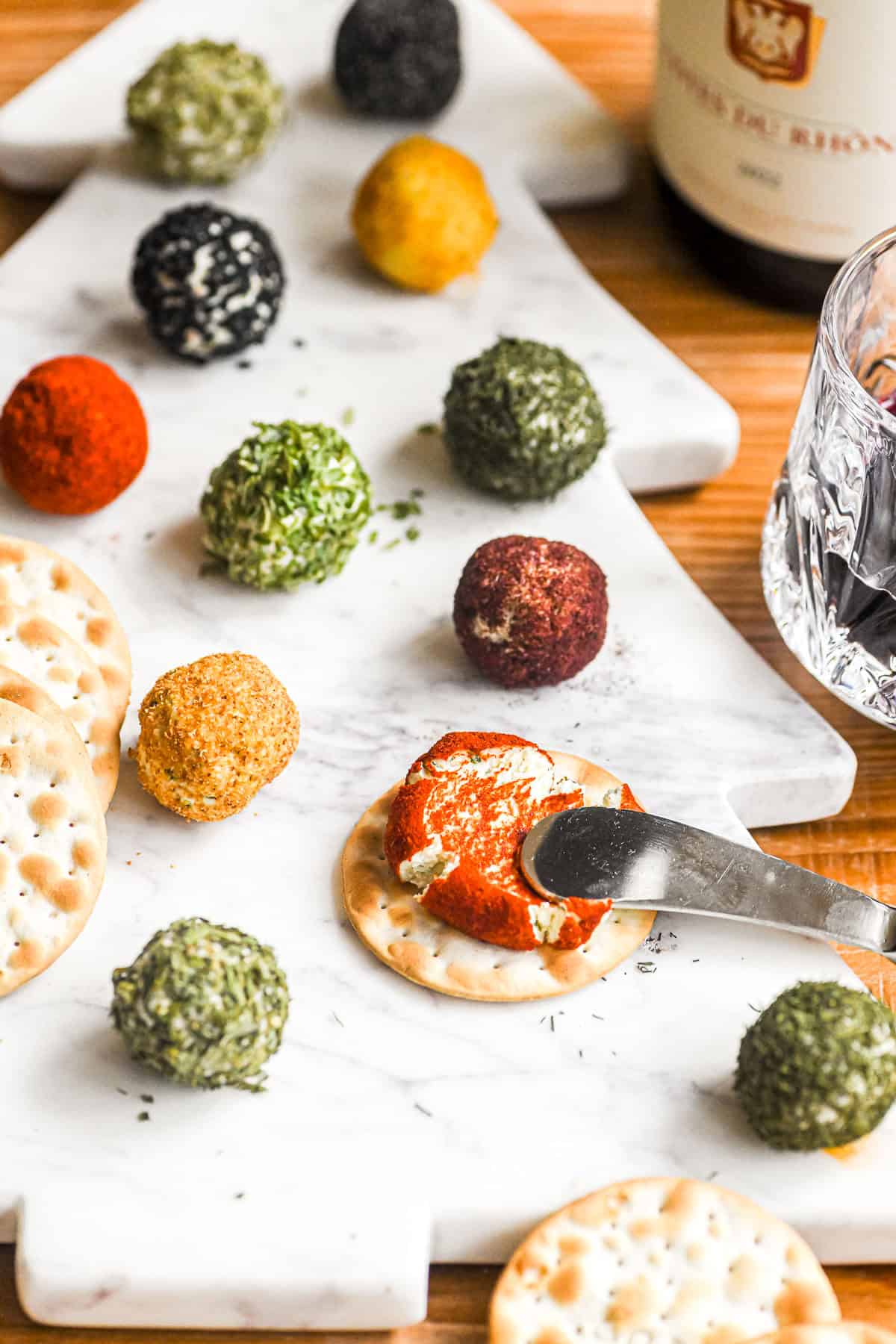 Mini Boursin Cheese Ball Holiday Appetizer plate on a tree shaped platter.