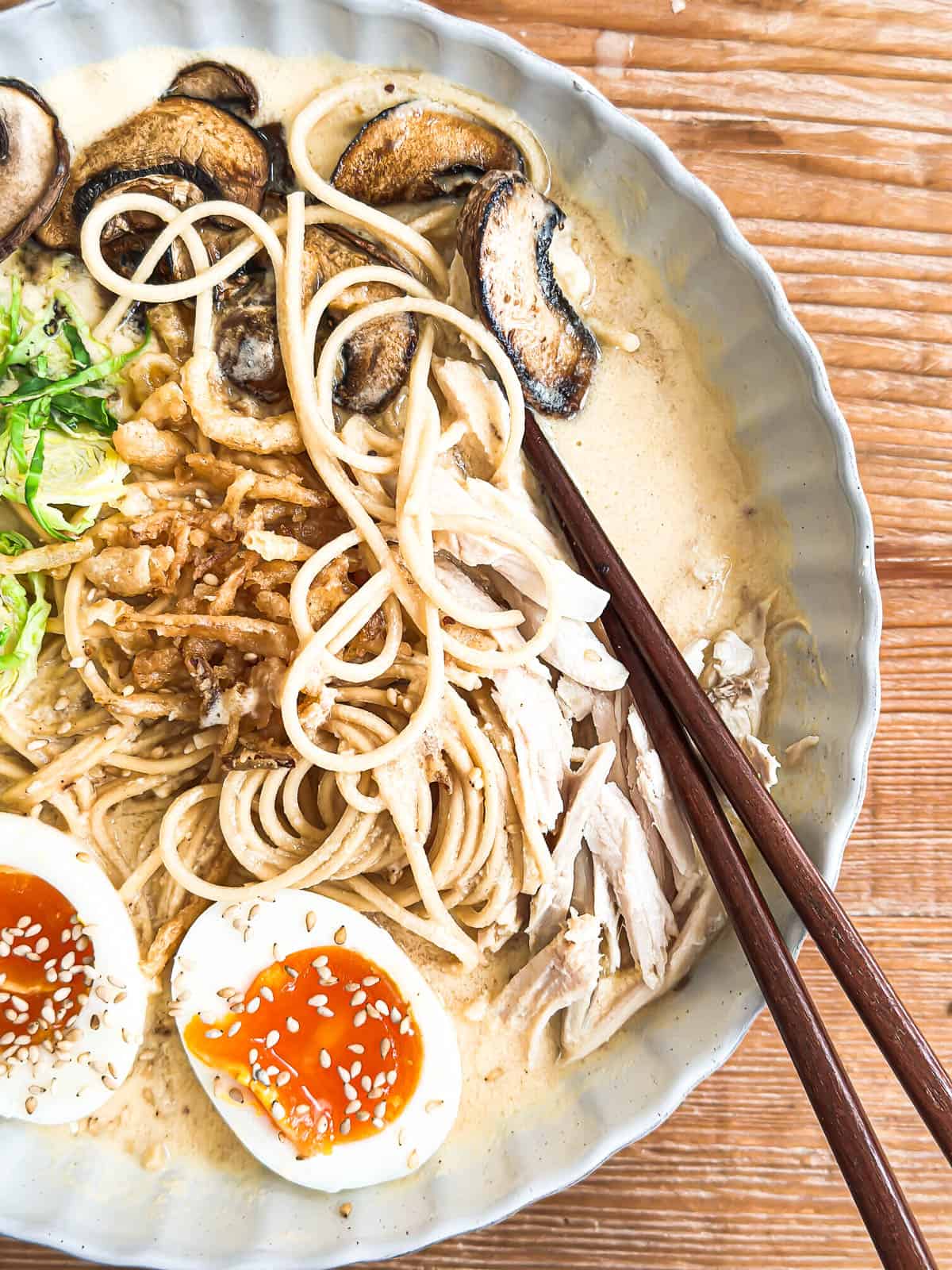 Creamy ramen with turkey in a bowl.