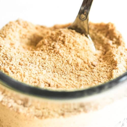 a small jar of homemade maple sugar, with spoon.