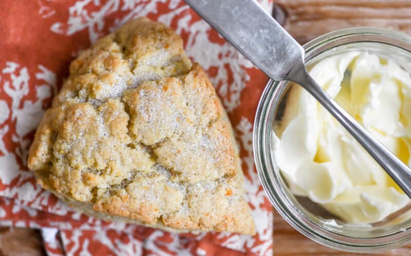close look at orange cardamom scones with butter.