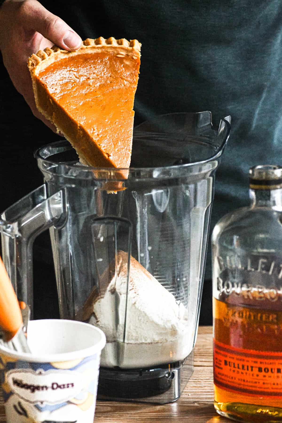blending a pumpkin pie bourbon milkshake dessert cocktail.