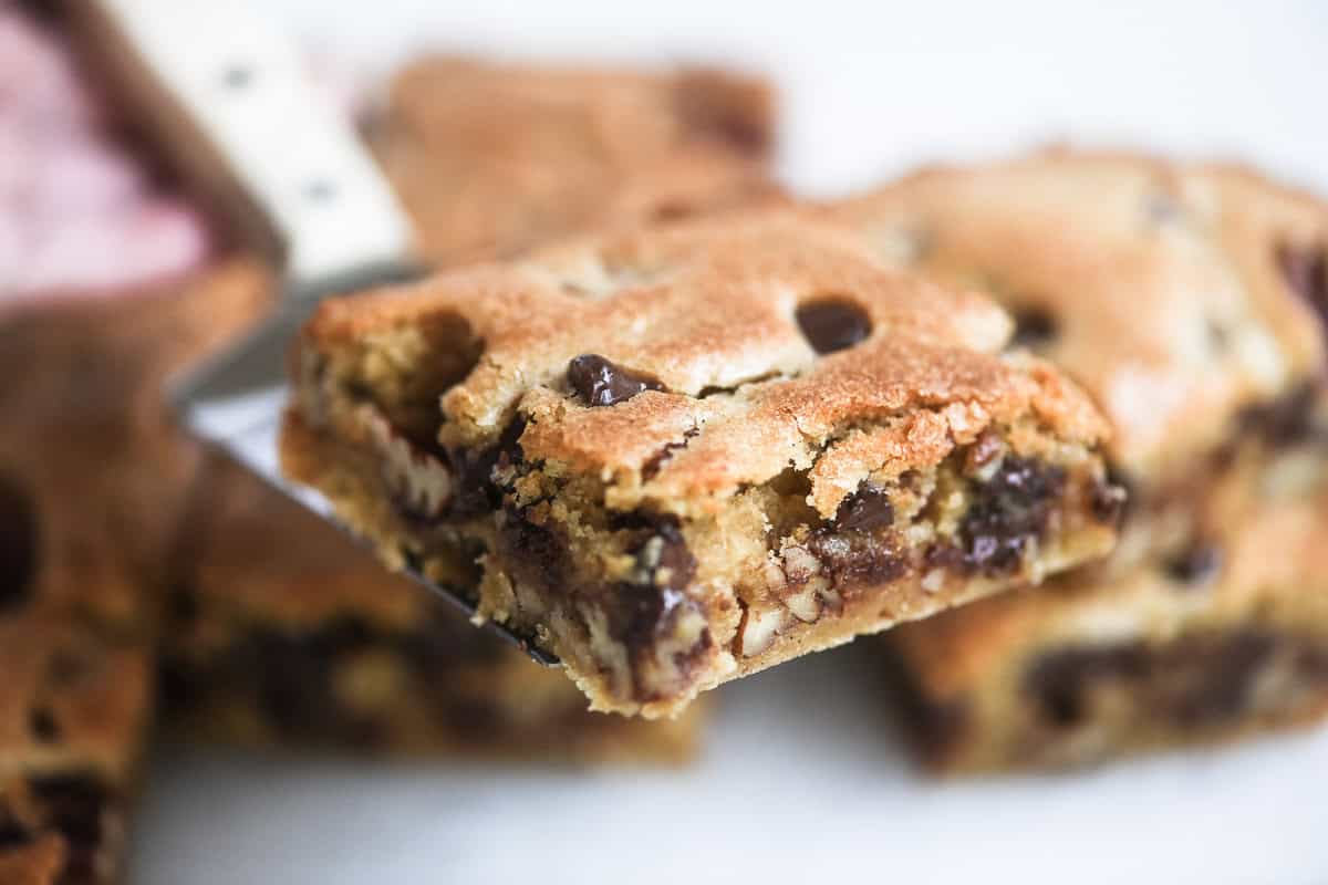a bourbon butter pecan brownie on a spatula.