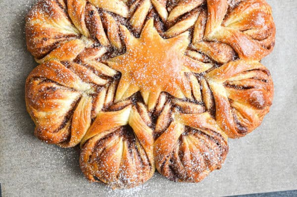 cinnamon star bread on parchment paper.
