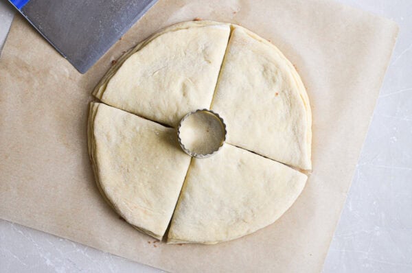 starting to slice through dough to make cinnamon star bread
