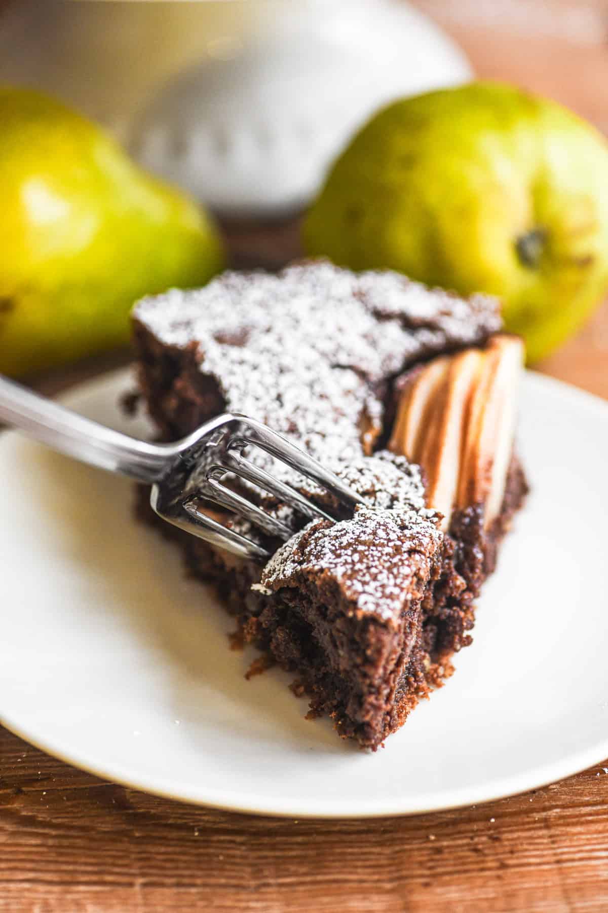 A slice of gluten free chocolate pear cake.