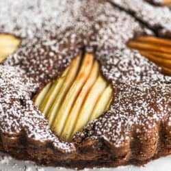 gluten free chocolate almond pear cake, topped with thin sliced pear halves.