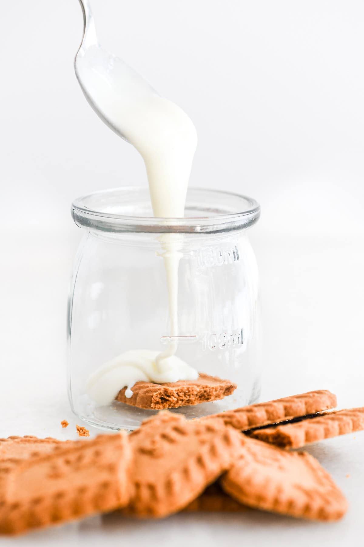making a 2-ingredient Japanese cheesecake with yogurt and Biscoff cookies.