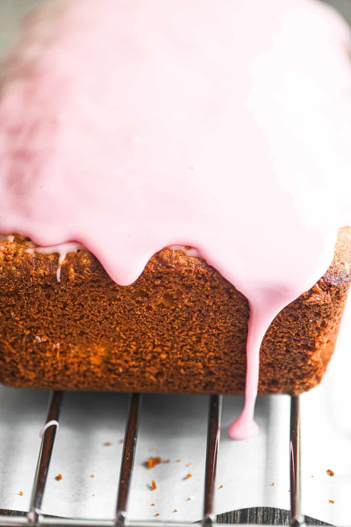 Glaze dripping from a blood orange pound cake.