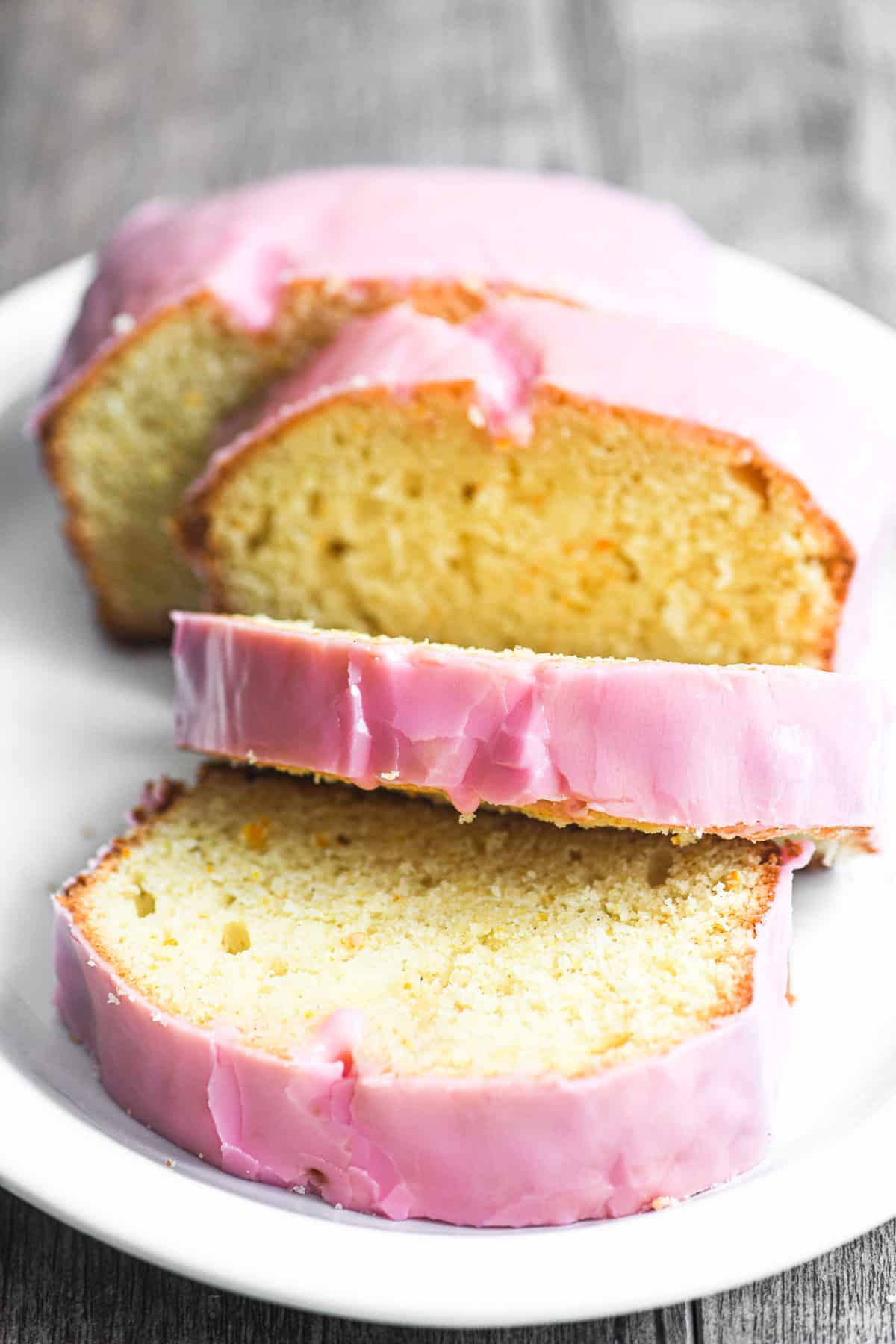 blood orange pound cake, sliced on a plate.