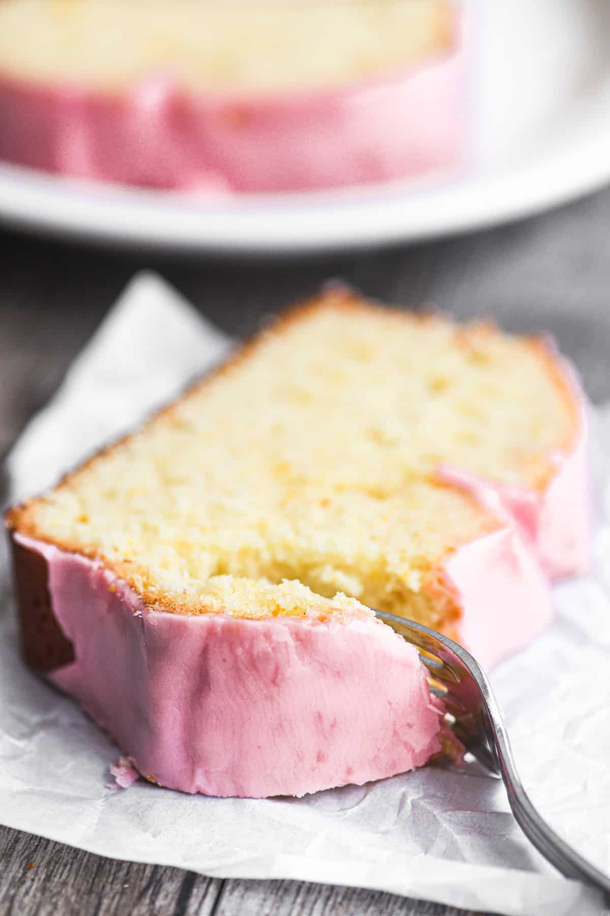 Taking a bite of glazed blood orange pound cake.