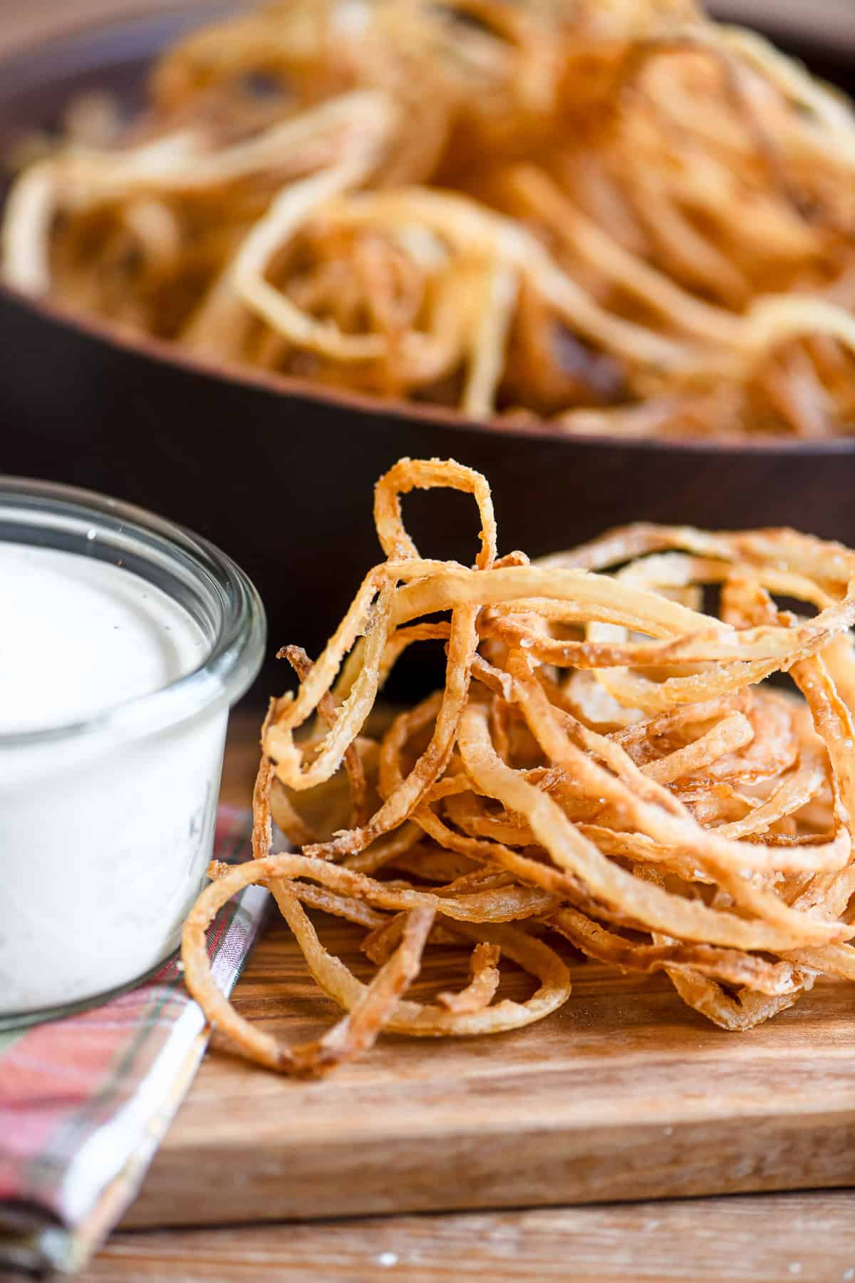 crispy onion strings with lemony dip.