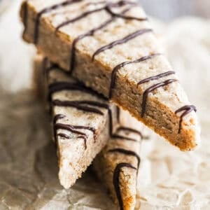 wedges of Turkish Coffee Shortbread stacked and drizzled with chocolate.