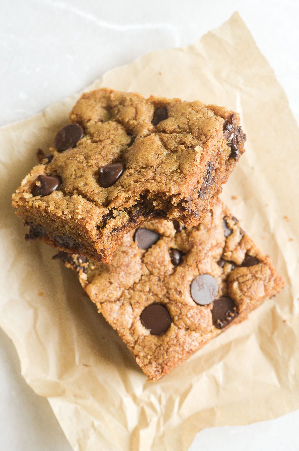cardamom coffee blondies on parchment paper.