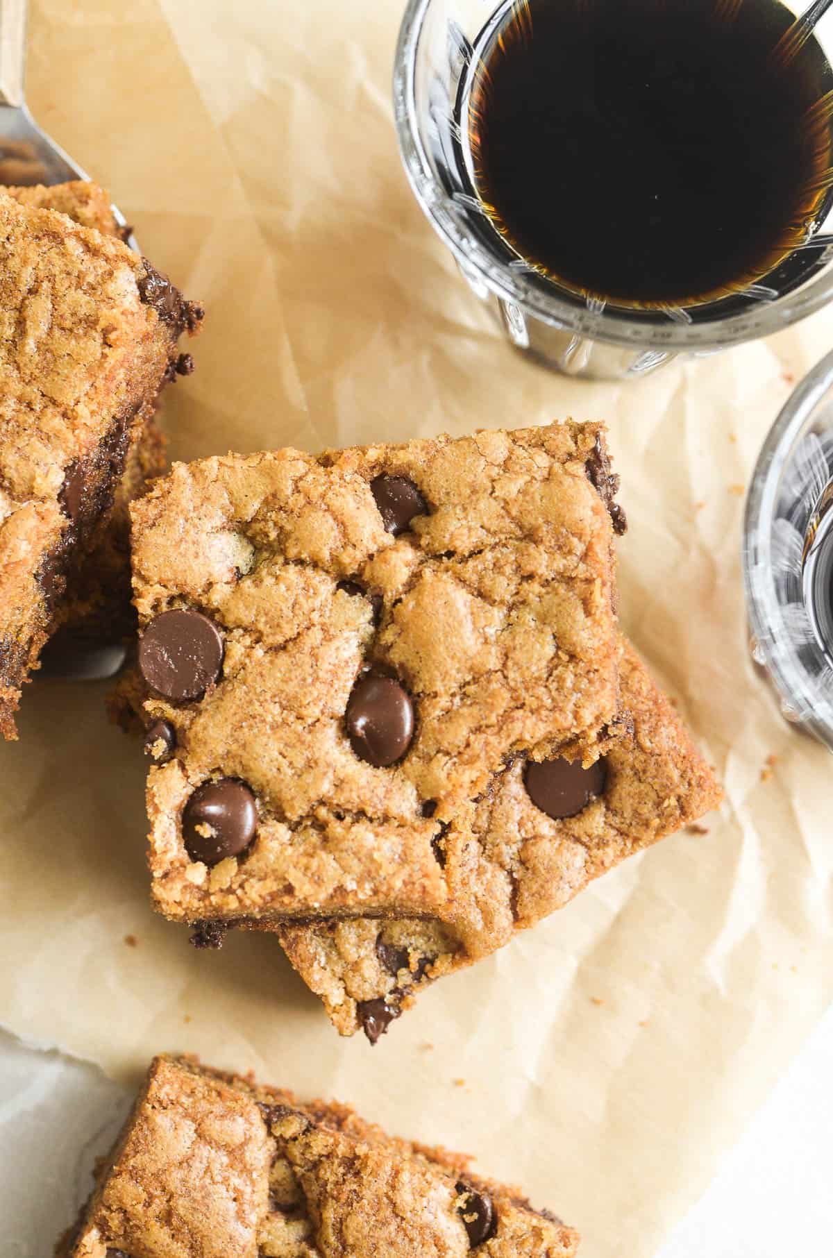 cardamom blondies with dark roast cup of coffee.