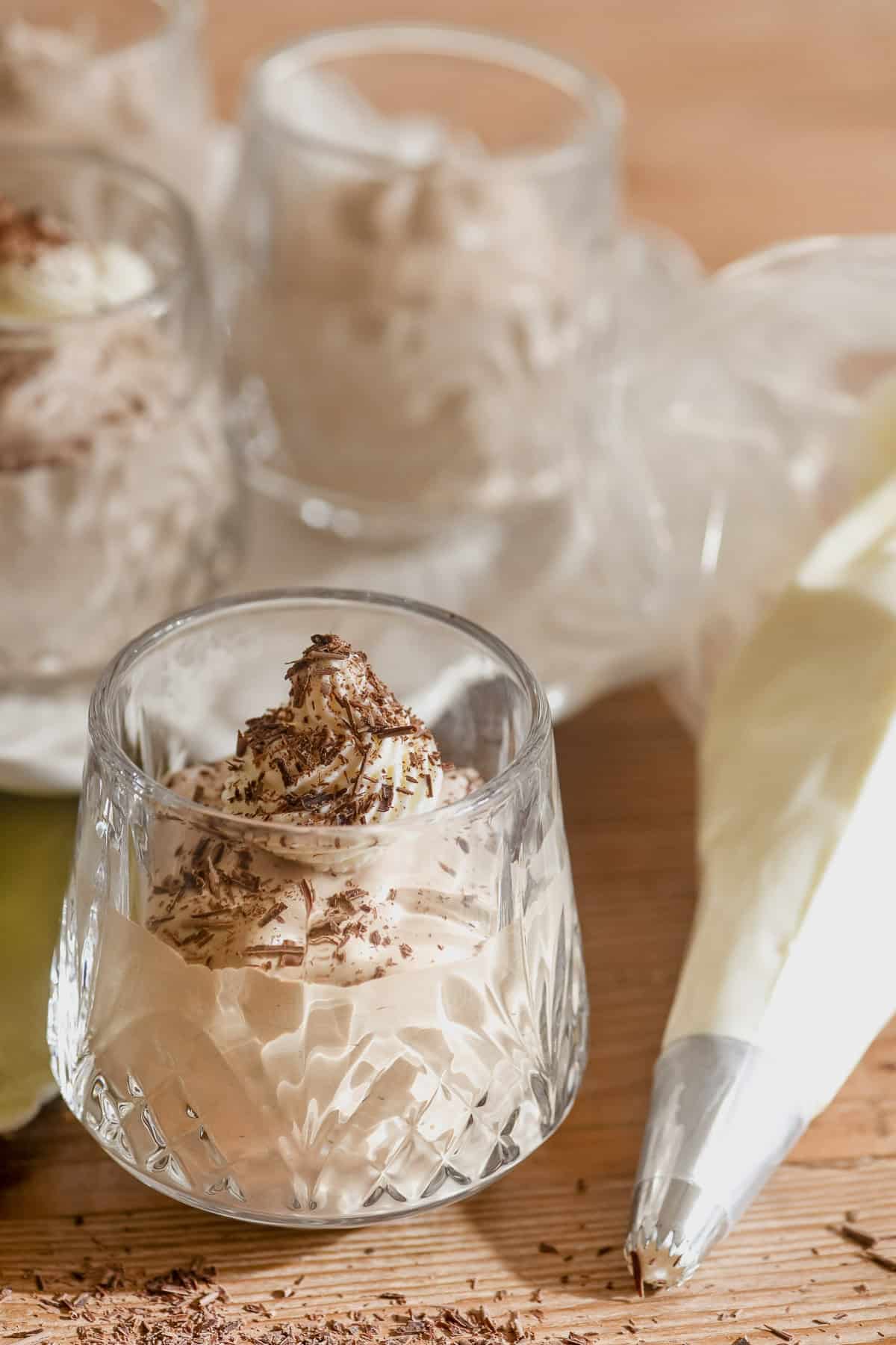 Bailey's Irish Cream Mousse in a glass with whipped cream.