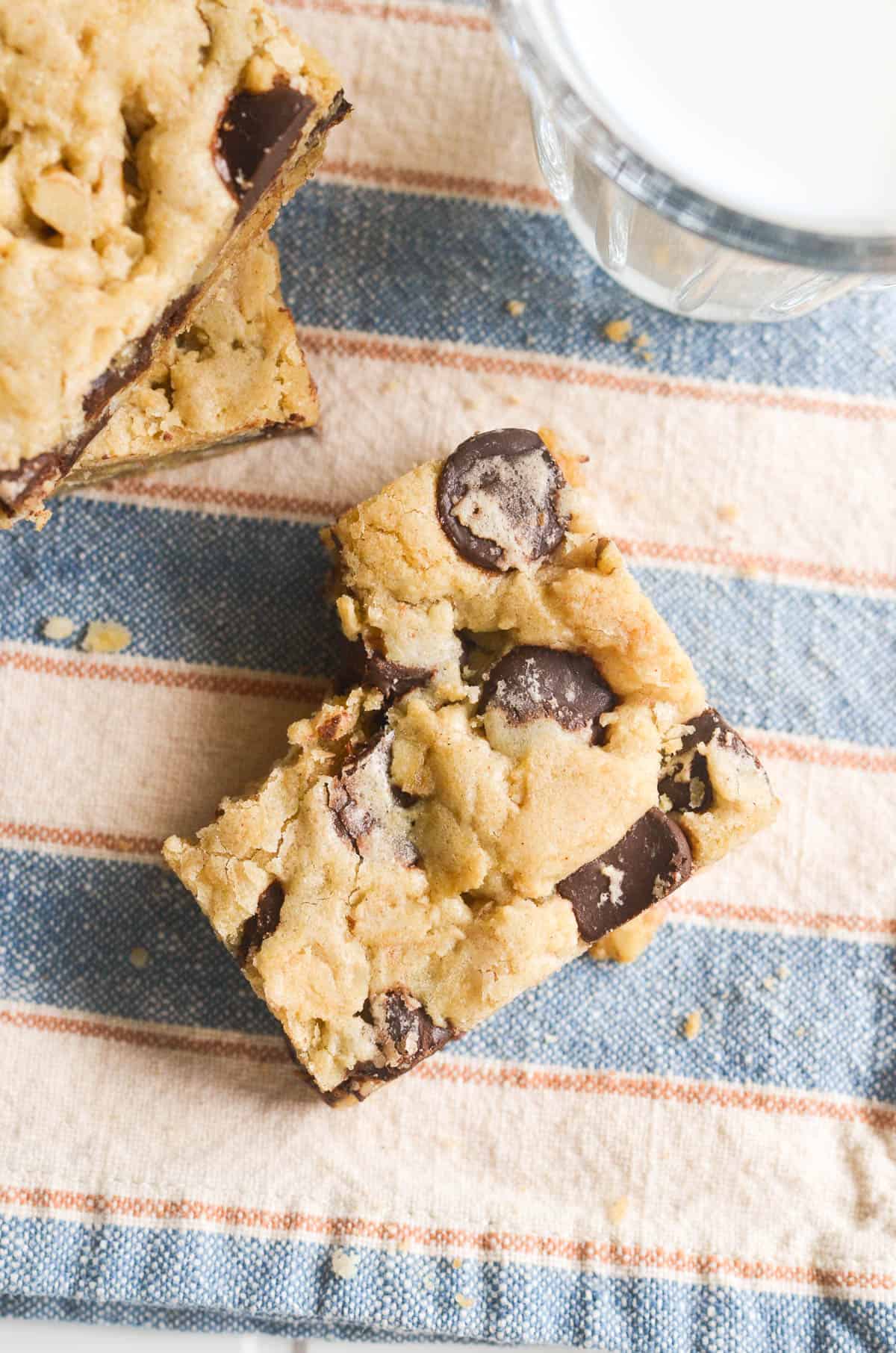 an oatmeal chocolate chip cookie bar with bite taken.