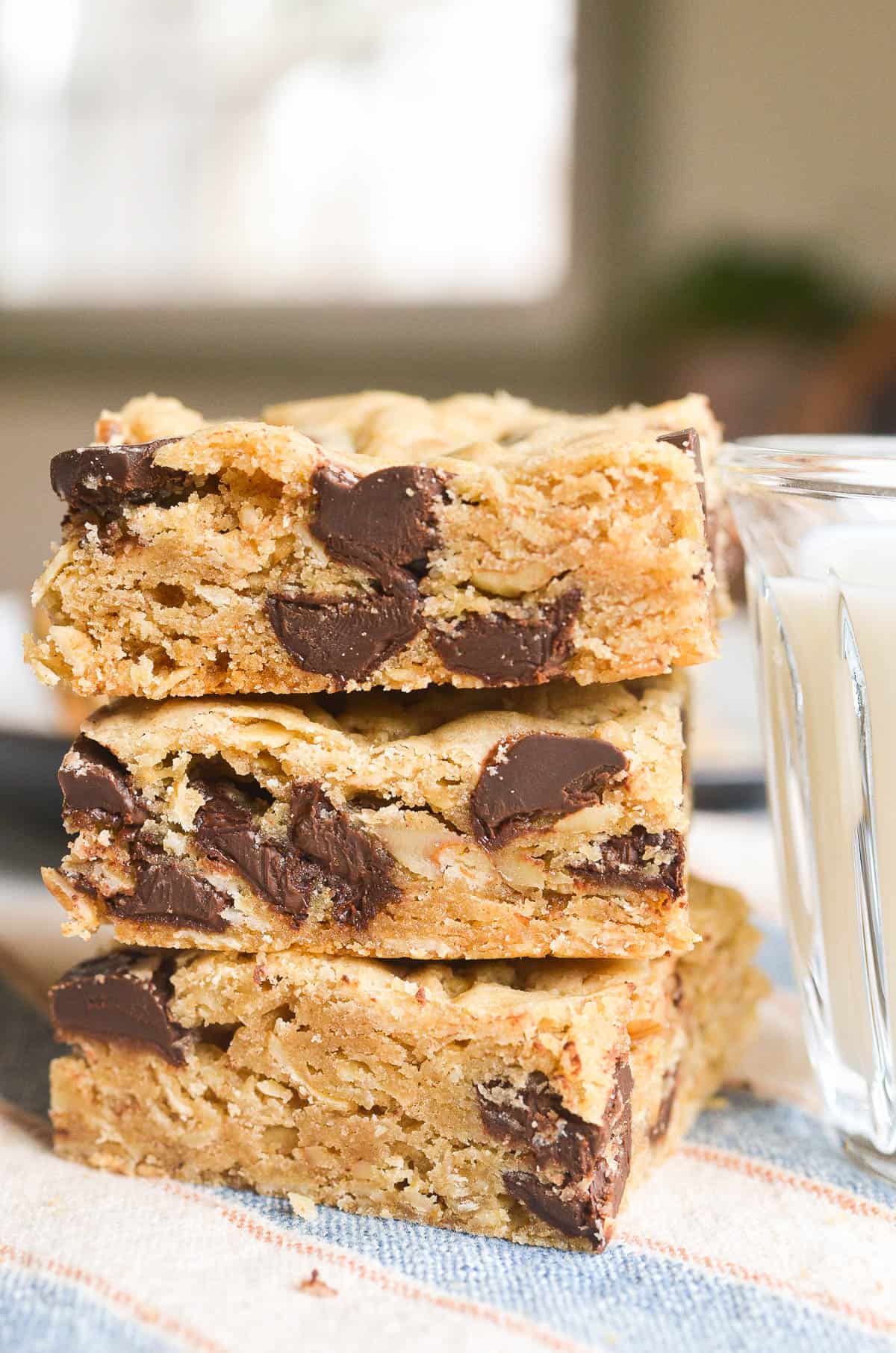 A stack of chocolate chip oatmeal cookie bars.