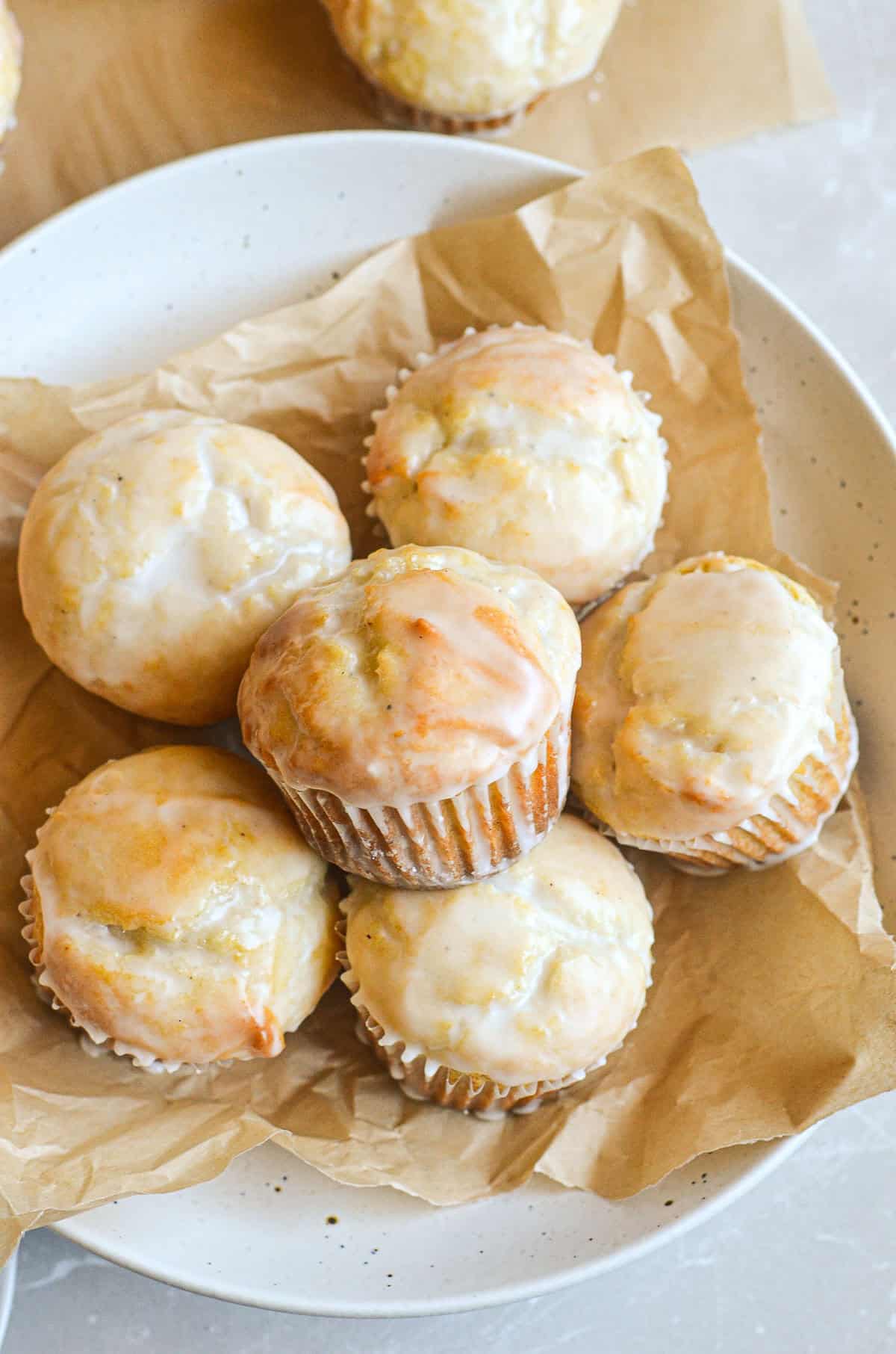 Glazed doughnut muffins on a plate.