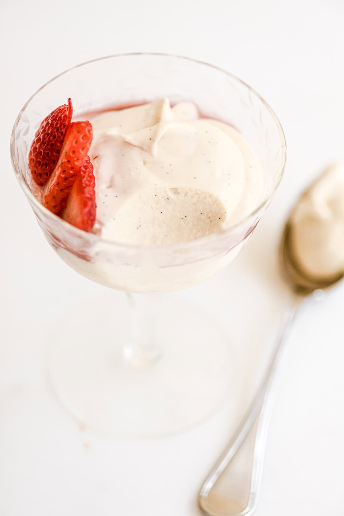 white chocolate mousse with spoonful taken.