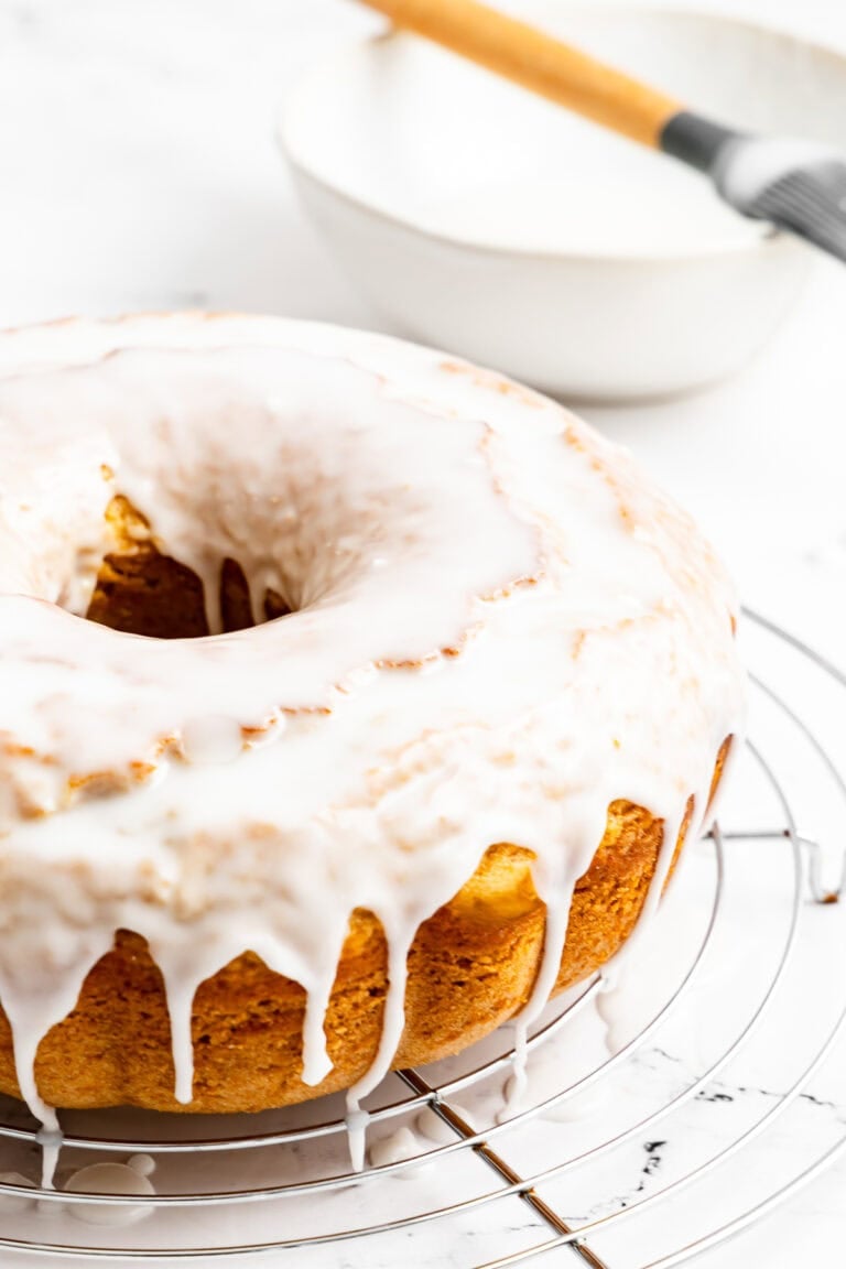 Old fashioned doughnut cake dripping with glaze.