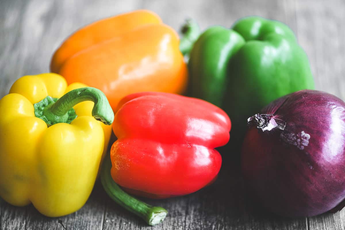 colorful peppers and red onion for fajita skewers.