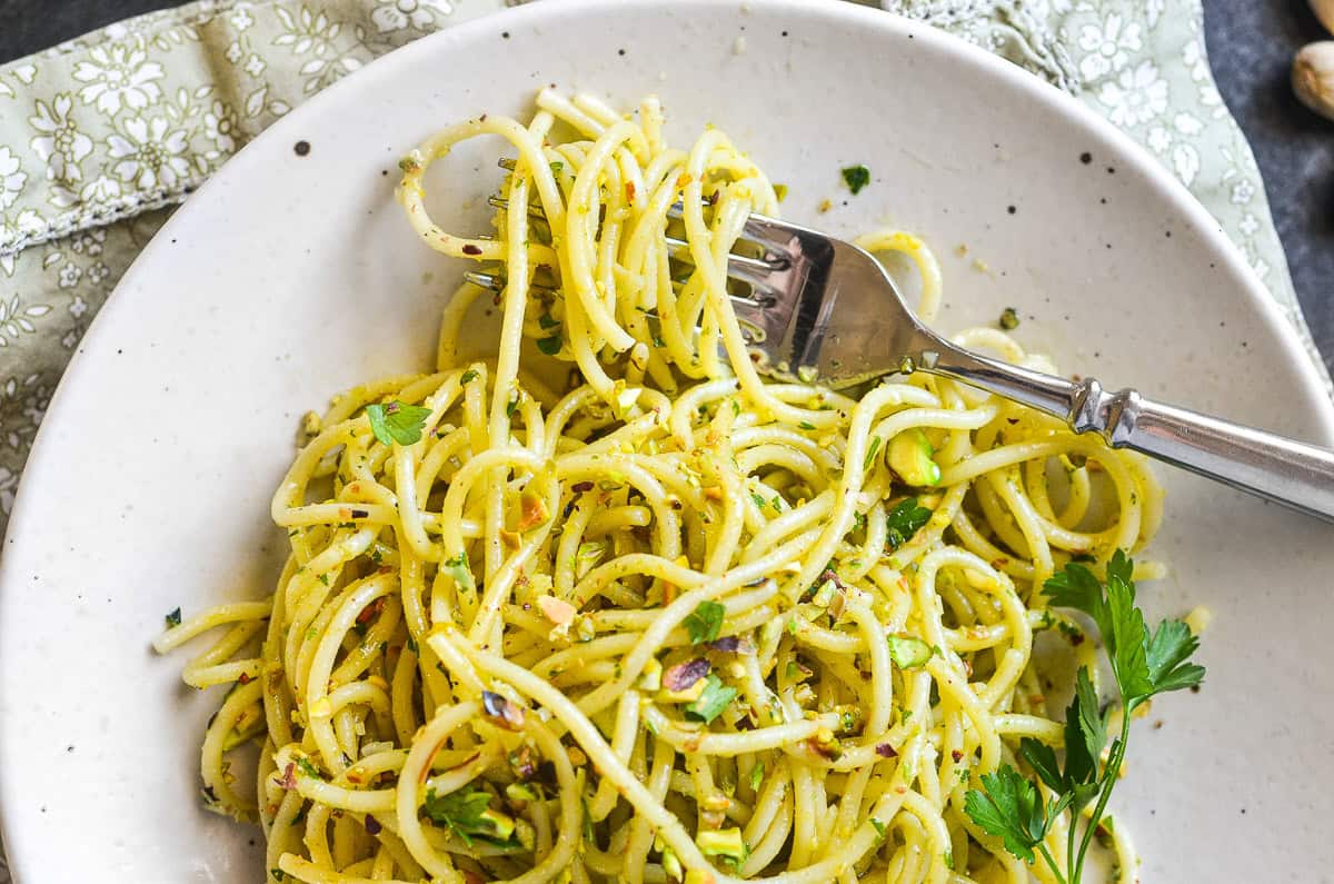 spaghetti tossed with pistachio pesto.