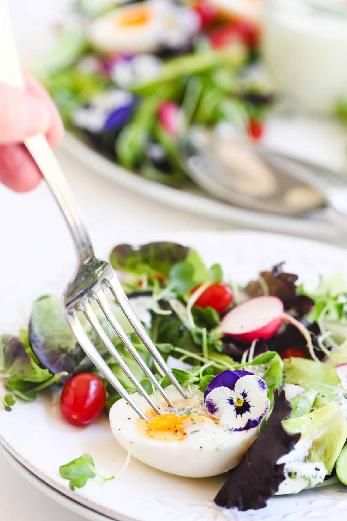 A spring wreath salad on an individual plate.