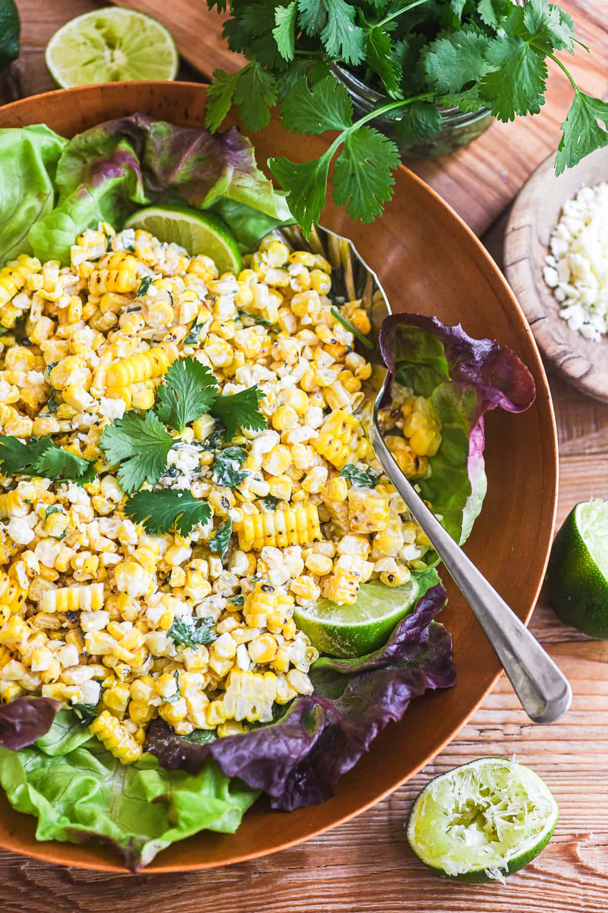 Mexican Street Corn Salad in a wooden bowl.