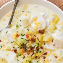 New England Fish Chowder in a bowl with bacon crumbles.