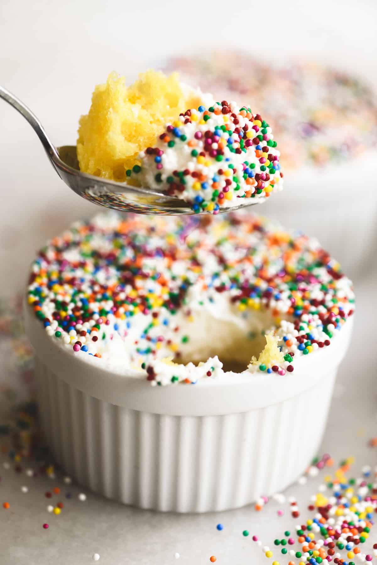 Taking a bite from a lemon dot cake.