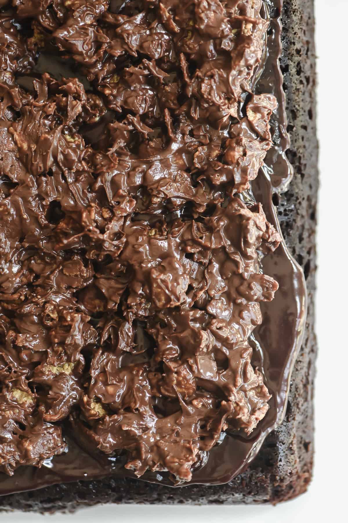 overhead look at a chocolate crunch cake, unsliced.