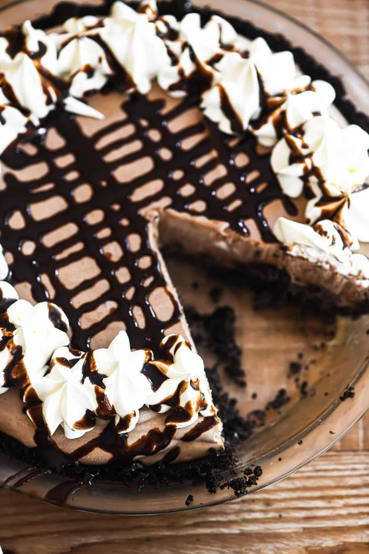 A frozen mudslide pie with slice taken.