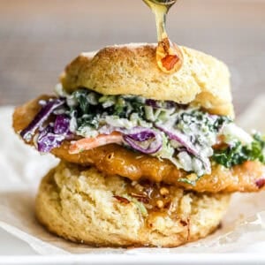Hot honey biscuits made into fried chicken sandwiches with slaw and hot honey drizzle.