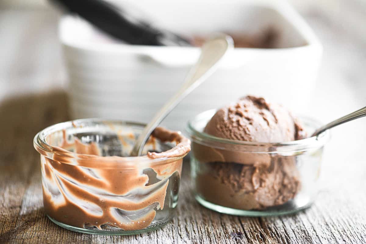 no churn Nutella ice cream in little jars, one empty.