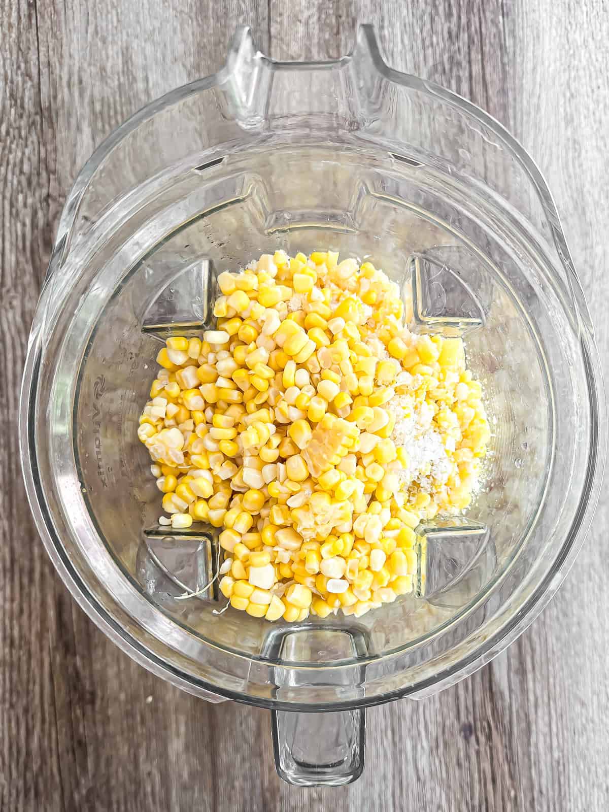 Corn kernels in a blender for sweet corn gazpacho.