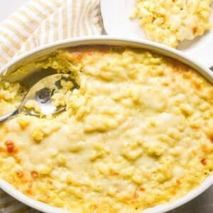 Sweet corn mac and cheese in a casserole dish, just out of the oven.