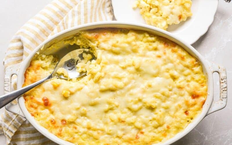 Sweet corn mac and cheese in a casserole dish, just out of the oven.