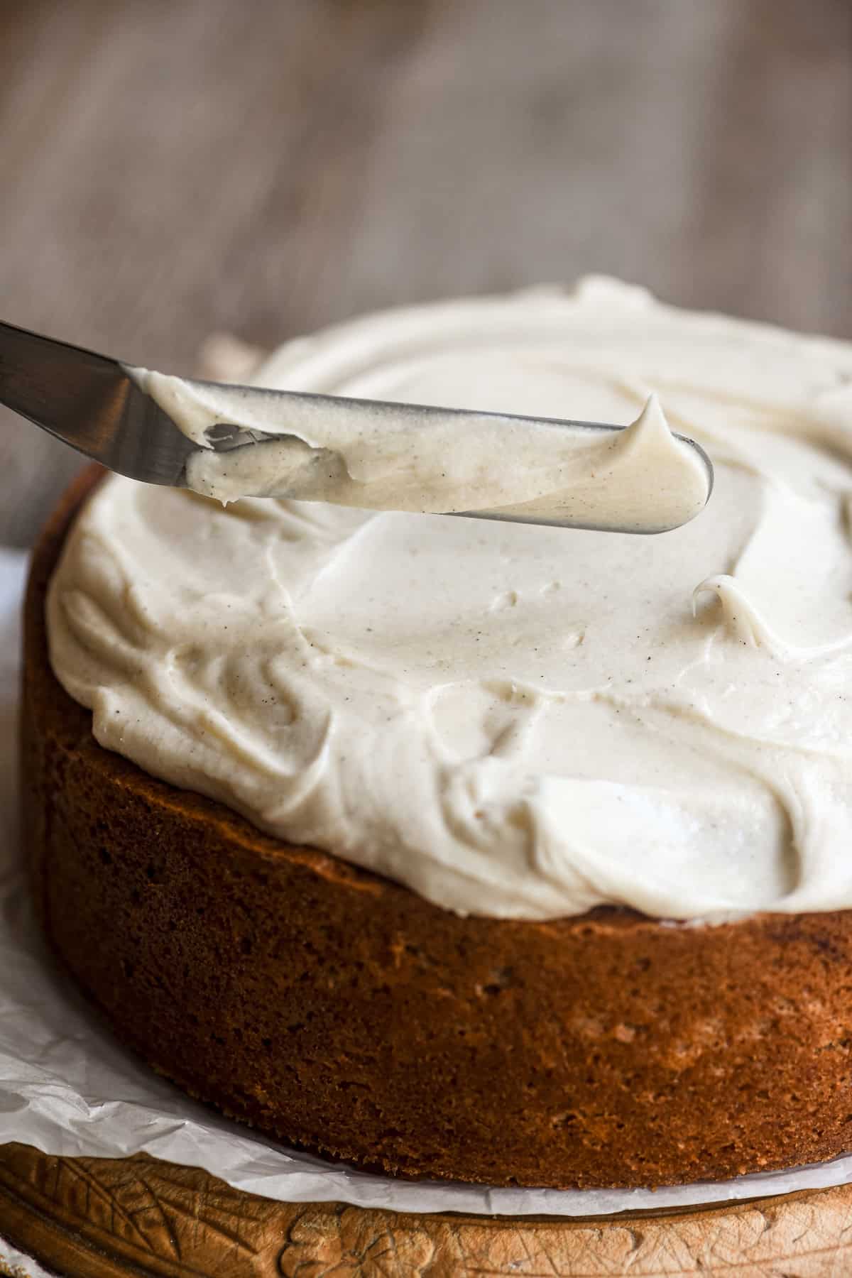 frosting a banana cake with spiced mascarpone frosting.