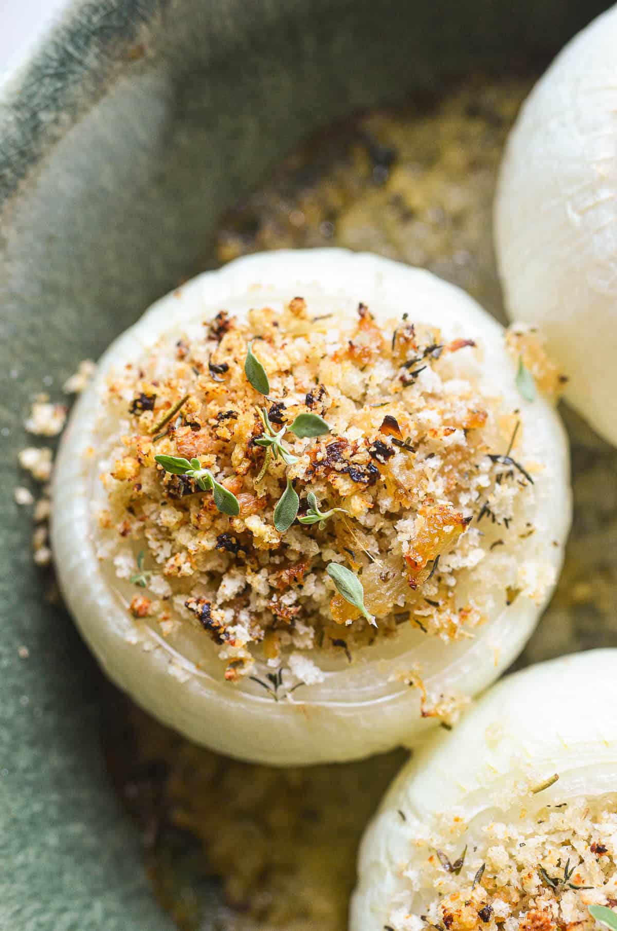 overhead look at a pan of stuffed onions, Provencal style.