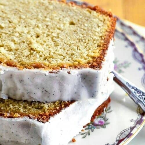 slices of cardamom coffee pound cake on a plate.