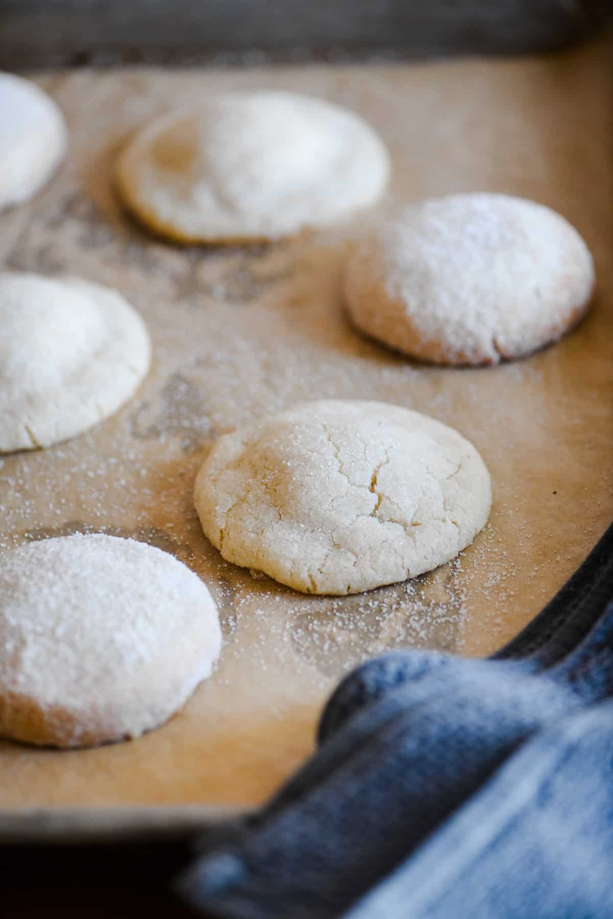 Swedish almond cardamom cookies on a cookie sheet.