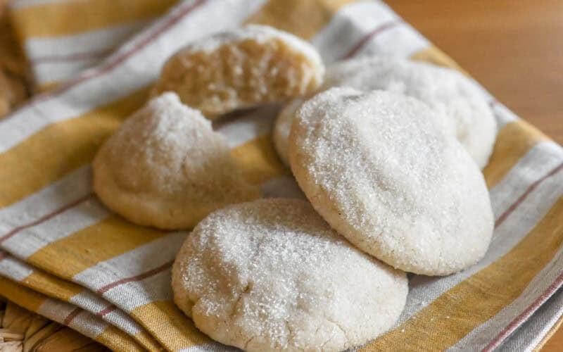 sigar coated Swedish almond cardamom cookies on a napkin.